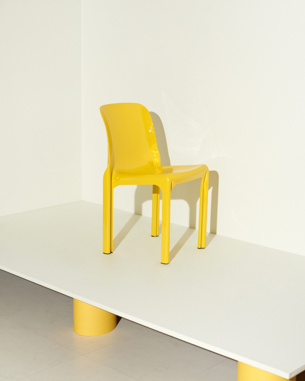 #9734 / Artemide Selene Chair By Vico Magistretti (yellow)